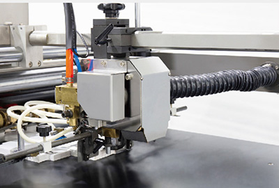 機械式後吸麵紙飛(fēi)達